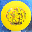 Load image into Gallery viewer, Top-down view of a pre-owned yellow 2020 Glass Blown Open Ring of Fire bottom stamped Dynamic Discs Guard putter disc golf disc in Classic Blend plastic scaled at 174g in 10 out of 10 uninked condition.
