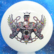 Load image into Gallery viewer, Top-down view of a pre-owned white and multicolor Truly Unique Dynamic Discs Judge putter disc golf disc in Fuzion DyeMax plastic scaled at 175g in 10 out of 10 uninked condition.
