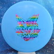 Load image into Gallery viewer, Top-down view of a pre-owned blue Chill At The Hill Fox tournament stamped Dynamic Discs Justice midrange disc golf disc in Classic Blend plastic scaled at 176g in 9.5 out of 10 uninked condition.
