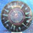 Load image into Gallery viewer, Top-down view of a pre-owned blue and black dyed Dynamic Discs Justice midrange disc golf disc in Lucid Metal Flake plastic scaled at 173g in 10 out of 10 uninked condition.
