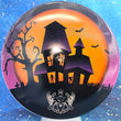 Load image into Gallery viewer, Top-down view of a pre-owned orange, black, and purple 08/31 Halloween Truly Unique stamped Dynamic Discs Justice midrange disc golf disc in Fuzion DyeMax plastic scaled at 174g in 10 out of 10 uninked condition.
