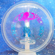 Load image into Gallery viewer, Top-down view of a pre-owned clear special edition Macie Velediaz Dynamic Discs Justice midrange disc golf disc in Lucid plastic scaled at 176g in 10 out of 10 uninked condition.
