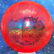 Load image into Gallery viewer, Top-down view of a pre-owned red special edition Shark Macie Velediaz Dynamic Discs Justice midrange disc golf disc in Fluid plastic scaled at 173g in 10 out of 10 uninked condition.
