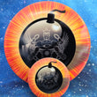 Load image into Gallery viewer, Top-down view of a pre-owned red and black Trilogy Man stamped Dynamic Discs Justice midrange disc golf disc in Classic Blend plastic in 9.5 out of 10 uninked condition.
