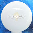 Load image into Gallery viewer, Top-down view of a pre-owned white The Ford stamped Dynamic Discs Maverick fairway driver disc golf disc in Fuzion plastic scaled at 173g in 10 out of 10 uninked condition.
