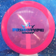 Load image into Gallery viewer, Top-down view of a pre-owned neon pink with blue stamp Prototype Dynamic Discs Sheriff distance driver disc golf disc in Lucid plastic scaled at 173g in 10 out of 10 uninked condition.
