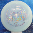 Load image into Gallery viewer, Top-down view of a pre-owned light blue Tina Oakley Whale Sak stamped Dynamic Discs Trespass distance driver disc golf disc in Hybrid plastic with silver foil stamp scaled at 169g in 10 out of 10 uninked condition.
