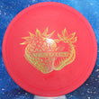 Load image into Gallery viewer, Top-down view of a pre-owned red strawberry scented Dynamic Discs Verdict midrange disc golf disc in Prime plastic scaled at 175g in 10 out of 10 uninked condition.
