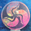 Load image into Gallery viewer, Top-down view of a pre-owned dyed multicolor Huk Lab bottom stamped Innova Destroyer distance driver disc golf disc in Jelly Bean Star plastic scaled at 172g in 9 out of 10 inked condition.
