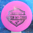 Load image into Gallery viewer, Top-down view of a pre-owned pink and black swirl 2020 Glass Blown Open Won My Card Latitude 64 Keystone putter disc golf disc in Zero Medium plastic scaled at 172g in 10 out of 10 uninked bag kept condition.
