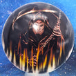 Load image into Gallery viewer, Top-down view of a pre-owned black and white Grim Reaper custom printed Latitude 64 Scythe distance driver disc golf disc in out of production Gold Line DyeMax plastic scaled at 173g in 10 out of 10 uninked bag kept condition.
