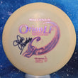 Load image into Gallery viewer, Top-down view of a pre-owned white penned patent number Hall of Fame John Houck signed First Run 1.1 Millennium Orion LF fairway driver disc golf disc in Sirius plastic scaled at 165g in 8 out of 10 signed condition.
