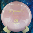 Load image into Gallery viewer, Top-down view of a light pink Prodigy D1 distance driver disc golf disc in 500 Glimmer plastic with a gold and pink foil Isaac Robinson 2x Worlds commemorative stamp.
