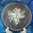 Load image into Gallery viewer, Top-down view of a black Prodigy PX3 putt and approach disc golf disc in 300 Soft plastic featuring a gold bubbles and white 2-foil Throwing Astro stamp.

