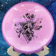 Load image into Gallery viewer, Top-down view of a pink Prodigy P Model OS putt and approach disc golf disc in 500 plastic featuring a rose and black foil Neon Astro stamp.
