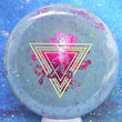Load image into Gallery viewer, Top-down view of a brand new Prodigy Special Edition Throwing Astro A5 approach disc golf disc in 400 Fractal plastic featuring a holographic astronaut foil stamp.
