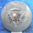 Load image into Gallery viewer, Top-down view of a brand new grey and silver Prodigy Special Edition Throwing Astro F9 fairway driver disc golf disc in 400 plastic featuring a silver and black hole holographic foil stamp.
