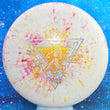 Load image into Gallery viewer, Top-down view of a second brand new white, yellow, and red fractal Prodigy Special Edition Throwing Astro PA-3 putter disc golf disc in Fractal 300 Glow plastic featuring a silver circles and gold shatter foil stamp.
