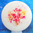Load image into Gallery viewer, Top-down view of a brand new white, yellow, and red fractal Prodigy Special Edition Throwing Astro PA-3 putter disc golf disc in Fractal 300 Firm plastic featuring a gold shatter and red matte foil stamp.
