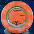 Load image into Gallery viewer, Top-down view of an orange and yellow swirled Streamline Runway midrange disc golf disc in Cosmic Neutron plastic featuring a tri-foil stock Runway stamp.
