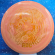Load image into Gallery viewer, Top-down view of a pre-owned orange swirl Innova Roc 2026 Worlds edition midrange disc golf disc in Star plastic scaled at 179g in 8.5 out of 10 uninked condition.
