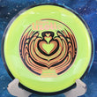 Load image into Gallery viewer, Top view of a Neon Yellow Axiom Bokeh Simon Lizotte Team Series fairway driver in Neutron plastic with a Black-Blue Swirl GYRO rim, featuring a Gold, Brown, and Gold Holo tri-foil "Bokeh Latte" stamp, 175g, 10/10 condition.
