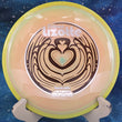 Load image into Gallery viewer, Top view of a Peach and Teal Swirl Axiom Bokeh Simon Lizotte Team Series fairway driver in Neutron plastic with a Yellow Swirl GYRO rim, featuring a Gold, Brown, and Silver Holo tri-foil "Bokeh Latte" stamp, 175g, 10/10 condition.
