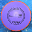 Load image into Gallery viewer, Axiom Envy in Electron Firm plastic featuring an Orange Rim and Purple Flight Plate with Black specialty stamp - 175g.
