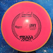 Load image into Gallery viewer, Axiom Envy in Electron Firm plastic featuring a Yellow Rim and Pink Flight Plate with Black specialty stamp - 167g.
