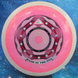 Load image into Gallery viewer, Pink Axiom Tenacity Made in the USA Special Edition in Neutron plastic with a White Rim and Red/Silver/Black stamp.
