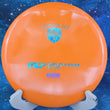 Load image into Gallery viewer, Top view of an Orange Discmania MD3 straight-stable midrange disc in S-Line plastic featuring a Blue and Purple Shatter 2-foil "Discmania" shield stamp.
