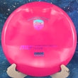 Load image into Gallery viewer, Top view of a Pink Discmania MD3 straight-stable midrange disc in S-Line plastic featuring a Blue and Pink Holographic 2-foil "Discmania" shield stamp.
