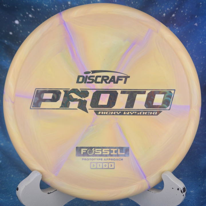 Discraft Proto Fossil Ricky Wysocki disc golf disc with a space-themed background