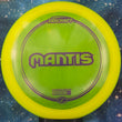 Load image into Gallery viewer, Neon Yellow Discraft Mantis fairway driver in Z Line plastic with a Purple Matte foil stamp.
