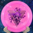 Load image into Gallery viewer, Vibrant pink swirl Discraft Nuke distance driver featuring a limited edition Throwing Astro two-foil stamp in purple and black.
