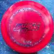 Load image into Gallery viewer, Light Red Discraft Surge SS in Z Line plastic with a Blue Roses foil stamp.
