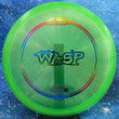 Load image into Gallery viewer, Lime Green Discraft Wasp in Z Line plastic with a Rainbow Holo foil stamp.

