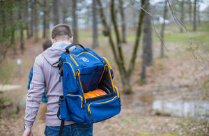 Discology Izzo Bag - Disc Golf Backpack - 26+ Disc Capacity - Large Storage Capacity