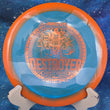 Load image into Gallery viewer, Orange and blue Halo Star Destroyer disc golf driver, 2026 Garrett Gurthie Champion Series tour stamp with bronze holo foil.
