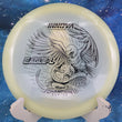 Load image into Gallery viewer, White Proto Color Glow Champion Eagle-L disc golf fairway driver, 2026 Sofia Donnecke Champion Series tour stamp with black foil.
