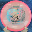 Load image into Gallery viewer, Top view of a Pink Proto Glow Halo Champion Innova Emily Weatherman Fox midrange featuring a glowing core and an Orange Holo tri-foil champion series stamp, 180g, 10/10 condition.
