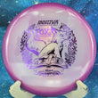 Load image into Gallery viewer, Purple and glow Proto Glow Halo Champion Fox midrange disc, 2026 Emily Weatherman Champion Series tour stamp with purple holo foil.
