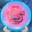 Load image into Gallery viewer, Blue and pink Halo Champion Gator3 disc golf midrange, 2026 Rasmus Saukkoriipi Champion Series tour stamp with red holo foil
