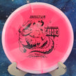 Load image into Gallery viewer, White and pink Halo Champion Gator3 disc golf midrange, 2026 Rasmus Saukkoriipi Champion Series tour stamp with black foil
