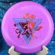 Load image into Gallery viewer, Top view of a Purple Innova JK Pro Aviar putter featuring an Orange and Light Blue 2-foil "Neon Astro" Special Edition astronaut stamp on a cosmic blue background.
