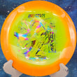 Load image into Gallery viewer, Orange and yellow Halo Champion Shryke disc golf driver, 2026 Jessica Gurthie Champion Series tour stamp with multi-color jelly bean foil.
