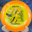 Load image into Gallery viewer, Orange and yellow Halo Champion Shryke disc golf driver, 2026 Jessica Gurthie Champion Series tour stamp with black holo foil.
