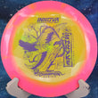 Load image into Gallery viewer, Pink and yellow Halo Champion Shryke disc golf driver, 2026 Jessica Gurthie Champion Series tour stamp with purple holo foil.
