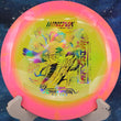 Load image into Gallery viewer, Pink and yellow Halo Champion Shryke disc golf driver, 2026 Jessica Gurthie Champion Series tour stamp with red holo foil.
