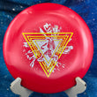Load image into Gallery viewer, Top view of a Red Innova Star Leopard disc featuring a Neon Yellow and Silver 2-foil "Neon Astro" Special Edition stamp on a cosmic blue background.
